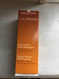 CLARINS - Eau lactée auto-bronzante 