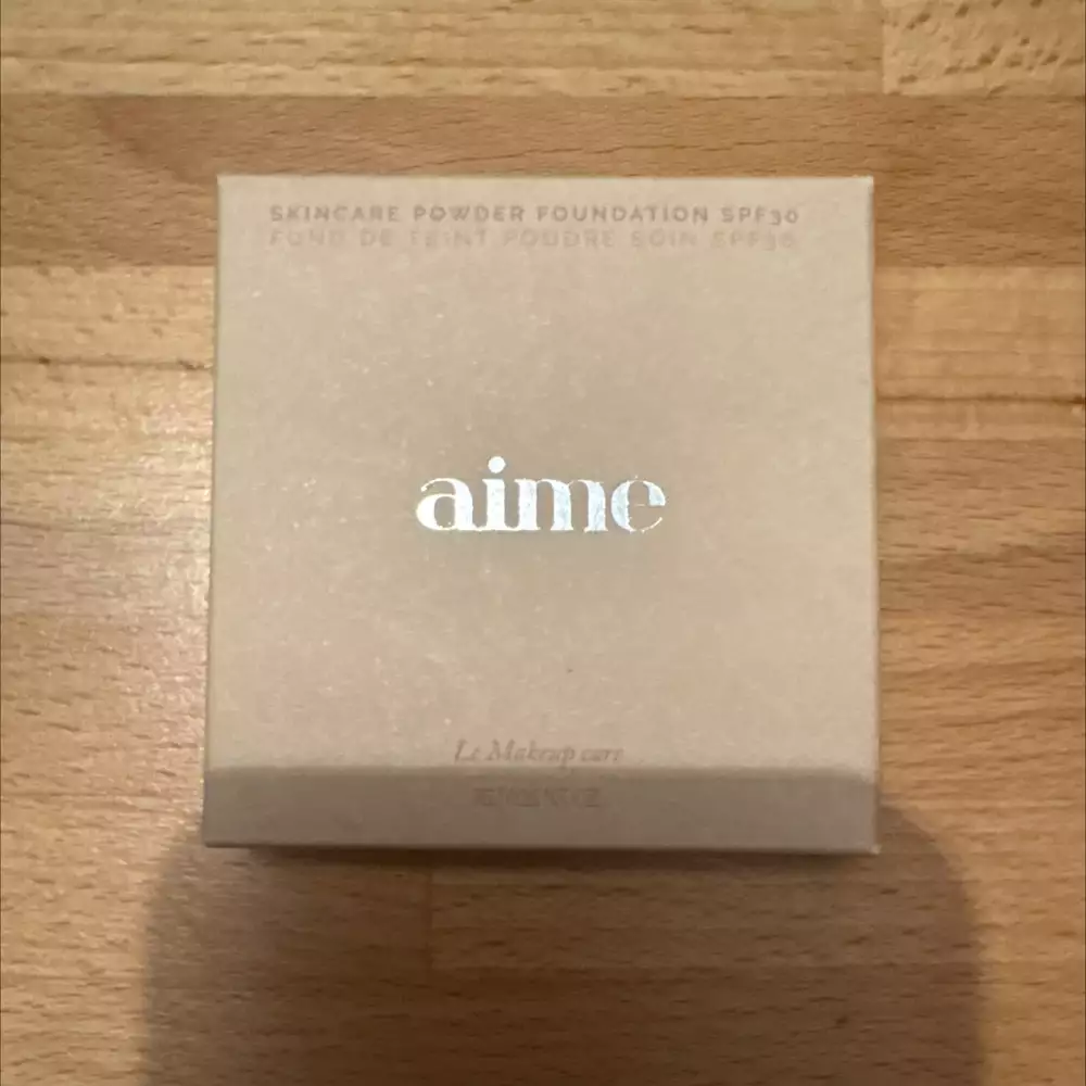 AIME - Fond de teint poudre soin SPF 50