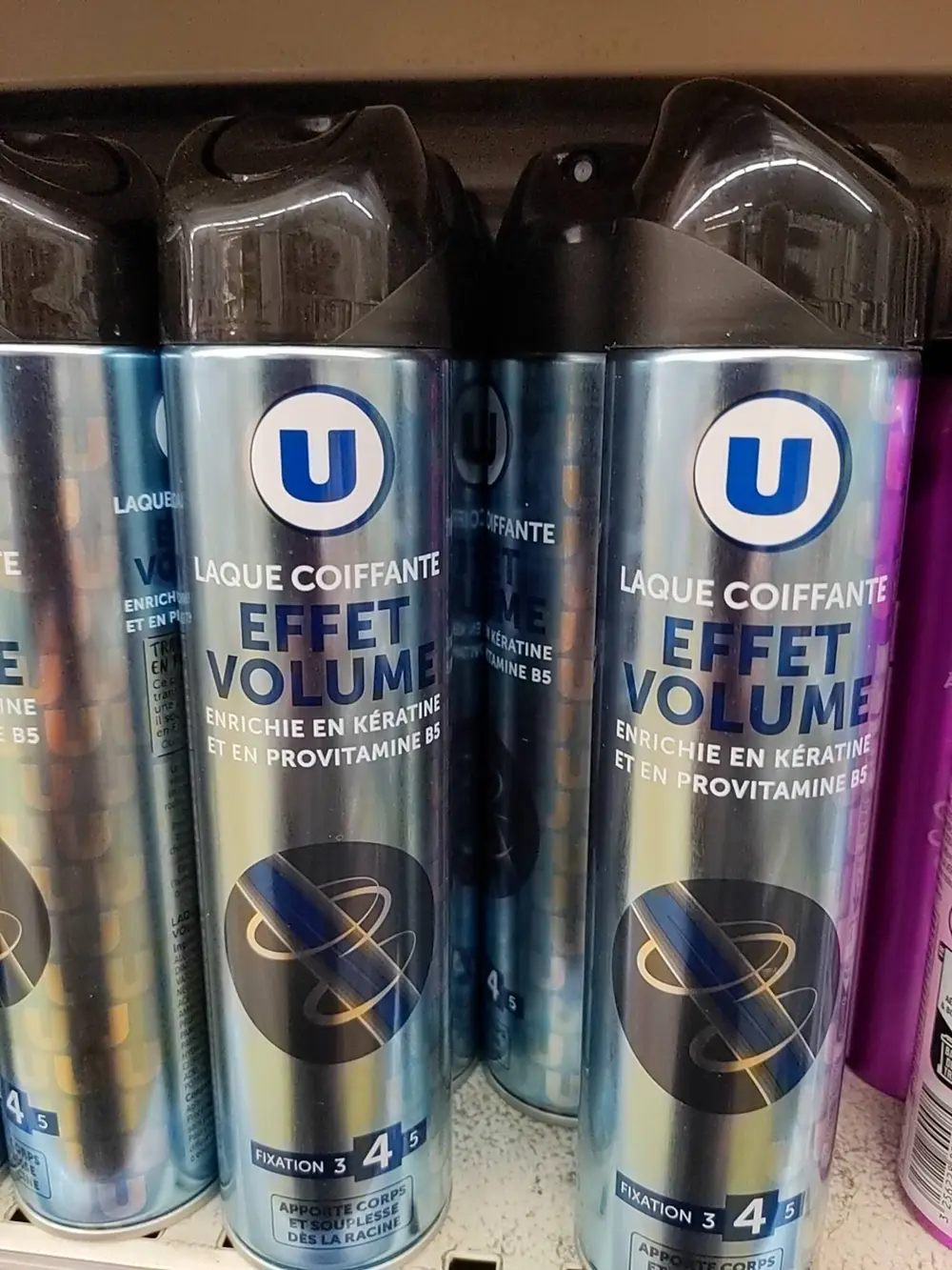 U - Laque coiffante effet volume