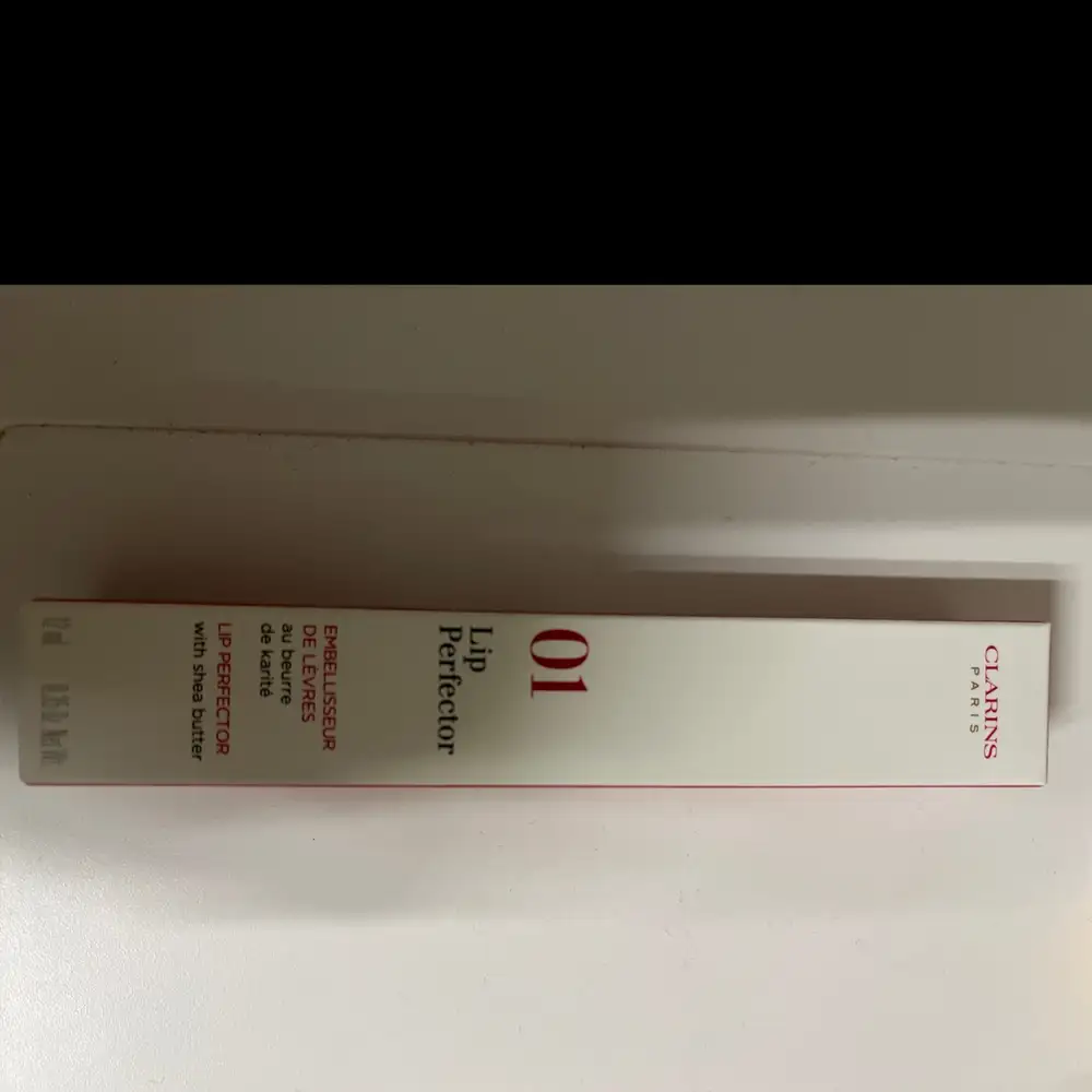 CLARINS - Embellisseur de lèvres au beurre de karité 01