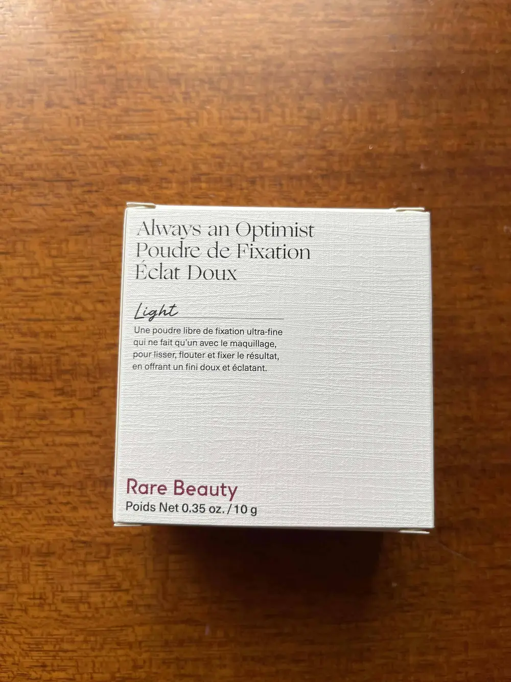 RARE BEAUTY - Poudre de fixation éclat doux