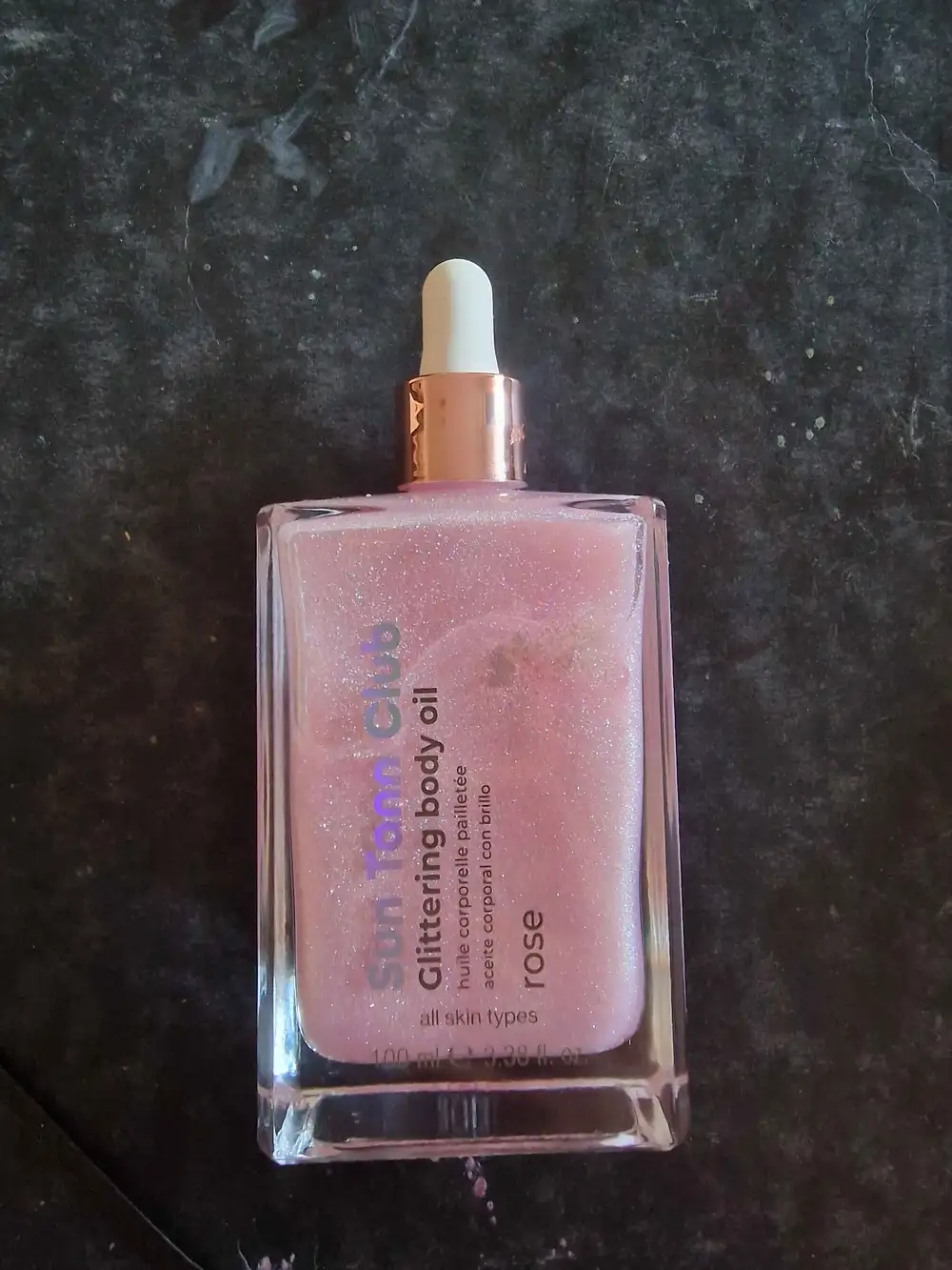 SUN TANN CLUB - Huile corporelle pailletée rose