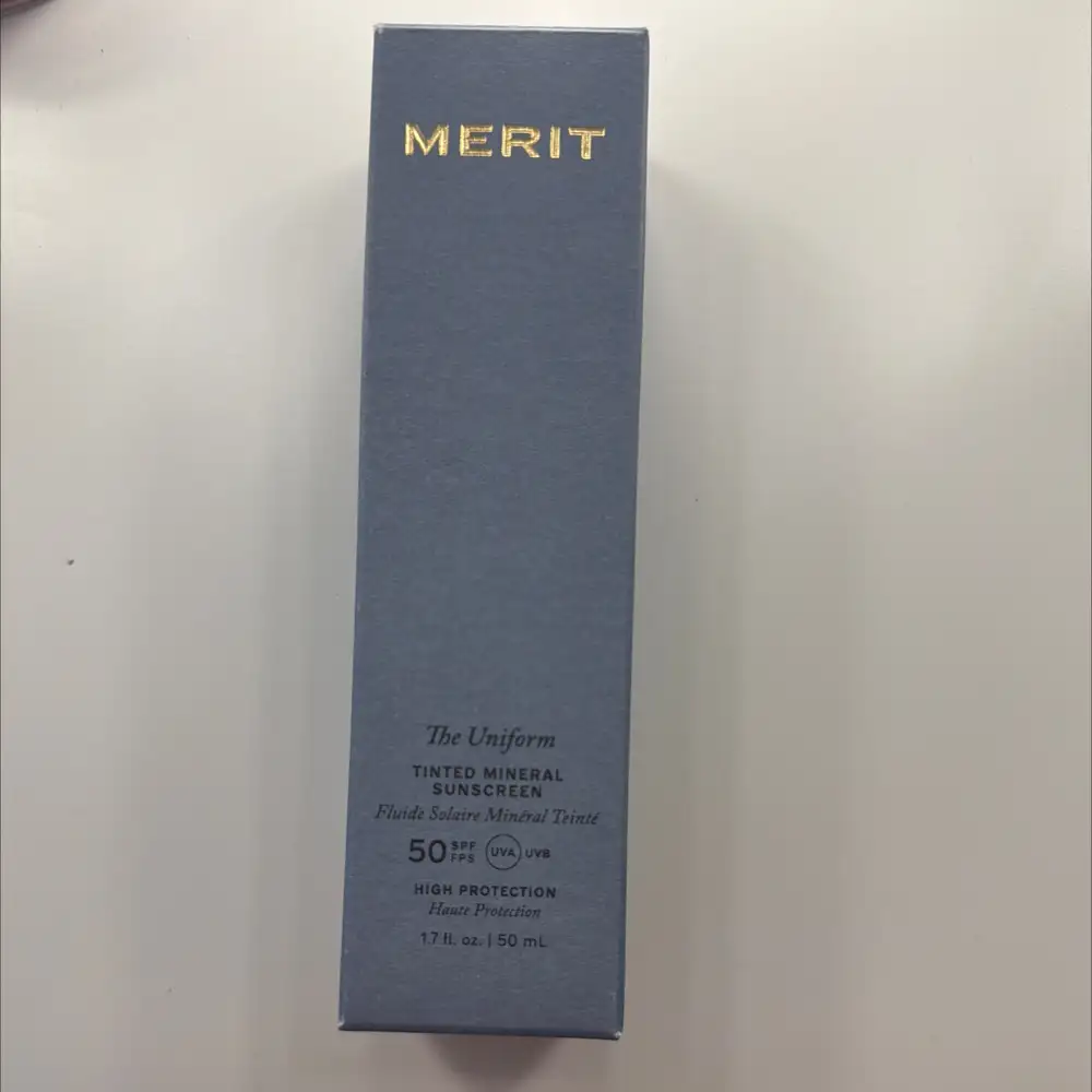 MERIT - The uniform - Fluide solaire minéral teinté SPF50