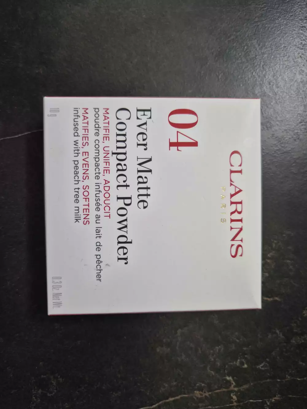 CLARINS - 04 Poudre compacte infusée au lait de pêcher