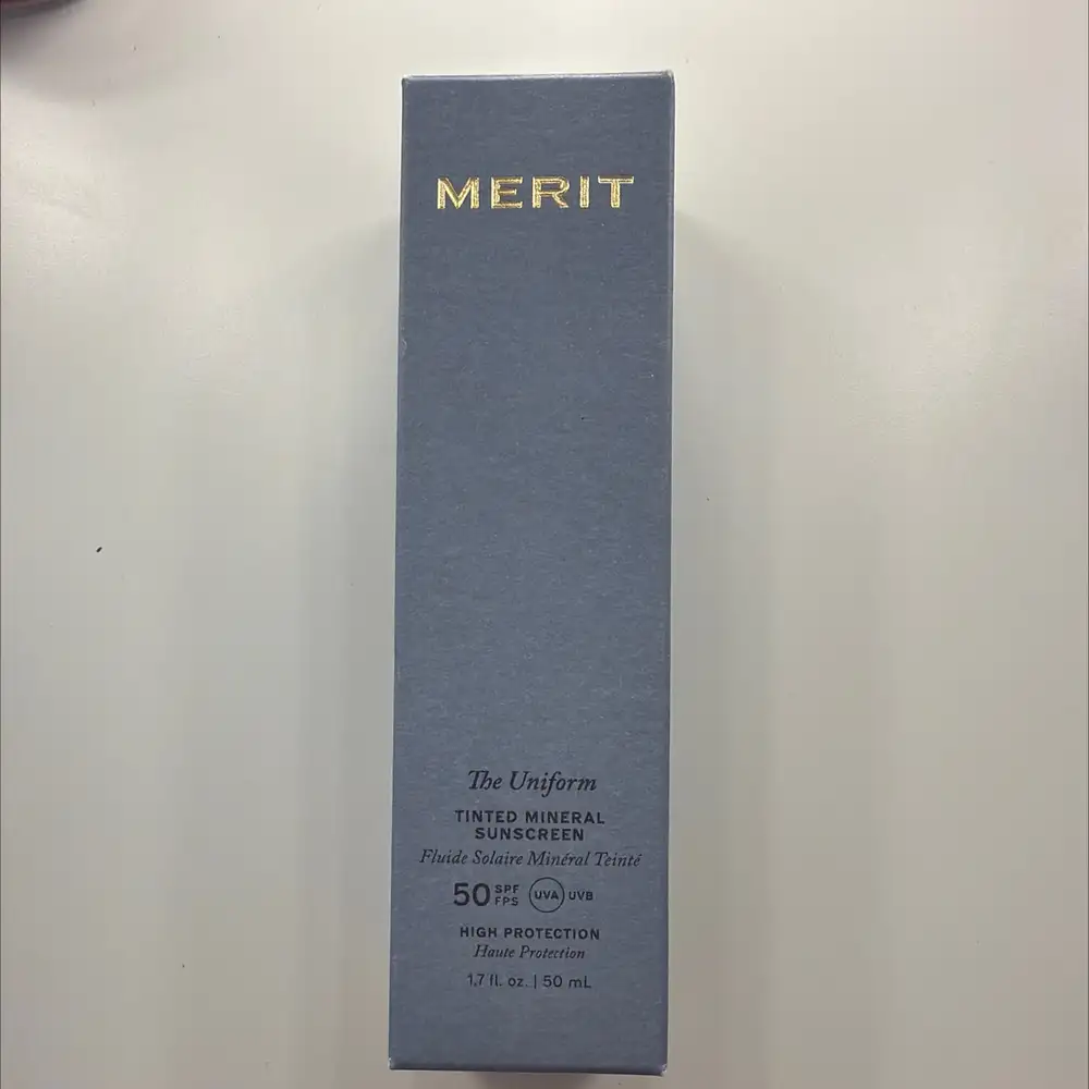 MERIT BEAUTY - The uniform - Fluide solaire minéral teinté SPF 50