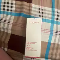 CLARINS - Voile corps clarté SPF20