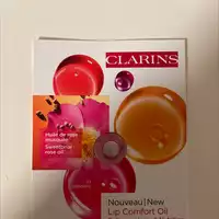 CLARINS - Lip comfort oil 02 raspberry