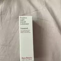 RARE BEAUTY - Positive light liquid luminizer