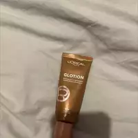L'ORÉAL - Glotion - Fluide enlumineur éclat foncé 904 