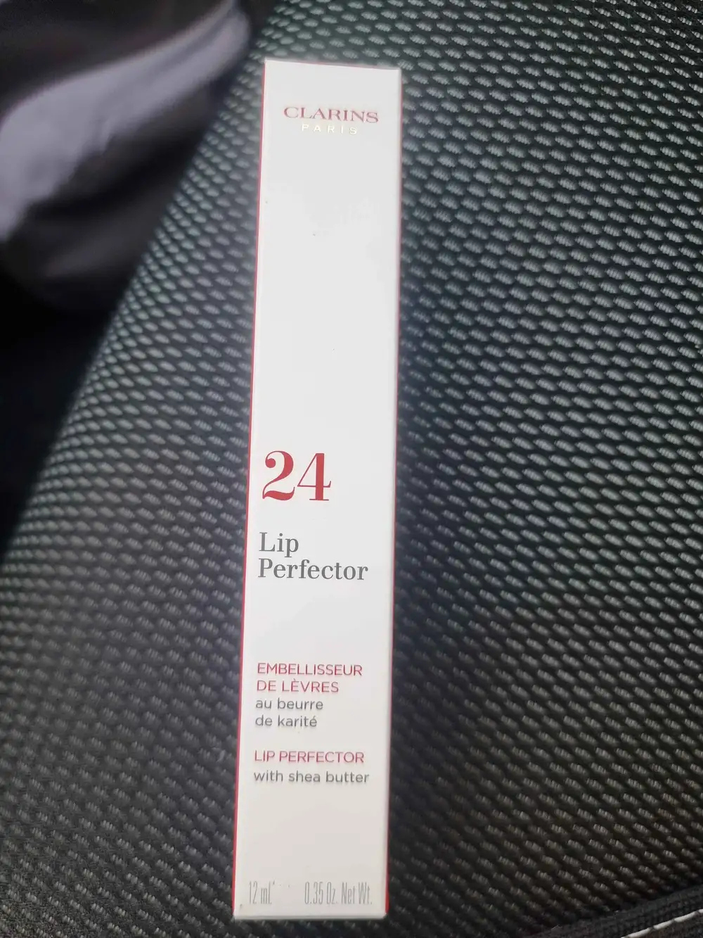 CLARINS - Embelliseur de lèvres au beurre de karité 24
